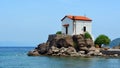 The Tiny Mermaid Madonna Church sits right by the harbour at Skala Sikaminias Lesvos Greece