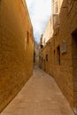 Tiny narrow empty street in Mdina