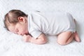 Tiny newborn baby sleeping on knitted blanket Royalty Free Stock Photo