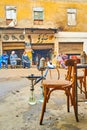 Tiny outdoor teahouse in shabby street, Cairo, Egypt