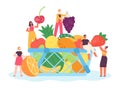 Tiny people with fruits and berries. Basket full of organic food as mango, watermelon, apple and pear