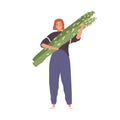 Tiny person holding big green asparagus stalks. Woman with healthy organic fresh vegetable in hands. Farmer carrying Royalty Free Stock Photo