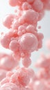 Tiny pink spheres cluster and float, representing nanotechnology concepts with delicate fluid motion. Royalty Free Stock Photo
