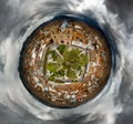 Tiny Planet of Parque Calderon on a stormy day