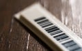 Tiny plastic security anti-theft barcode Royalty Free Stock Photo