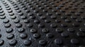 Tiny raised circular patterns tered across the surface adding a level of grip and elasticity to the otherwise rigid