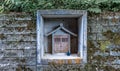 Shrine set in wall, Kanazawa, Ishikawa Prefecture, Japan.