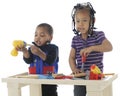 Tiny Sibling Carpenters Royalty Free Stock Photo