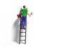 Miniature figurine character with ladder and red paint in front of a wall Royalty Free Stock Photo