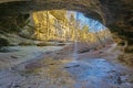 Tiny Waterfall Flowing in a Limestone Cave and Canyon