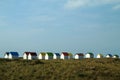 The tiny white beach cottages with colorful roofs Royalty Free Stock Photo