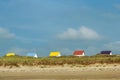 The tiny white beach cottages with colorful roofs Royalty Free Stock Photo