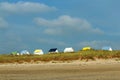 The tiny white beach cottages with colorful roofs Royalty Free Stock Photo