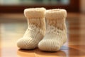 Tiny wool socks for baby.Pregnancy and motherhood concept