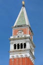 tip of the bell tower in Venice with the statue of the winged li