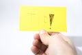 Tip handwrite with a hand on a yellow paper