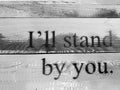 I will stand by you tip print on wood wall Royalty Free Stock Photo