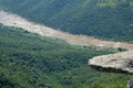 TIP OF LEOPARD ROCK OVERHANG AND VIEW OF MZIMKHULU RIVER IN ORIBI GORGE CANYON Royalty Free Stock Photo