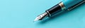 Tip of luxury fountain pen isolated on blue background Royalty Free Stock Photo