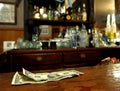 Tip Money On The Bar Royalty Free Stock Photo
