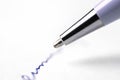 Tip of pen writing on paper Royalty Free Stock Photo