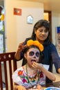 Catrina`s make up in a child