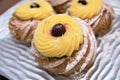 Tipical sweet italian dessert zeppole of san giuseppe day festivity event pie with cream cherry Royalty Free Stock Photo