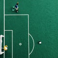 Tipp kick soccer parlor game with green background a goalkeeper in a goal and a football player Royalty Free Stock Photo