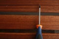 Tipped star screwdriver in orange, blue, and black colors