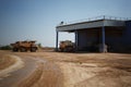 Dump trucks, dumper or tipper trucks full of stones in a sand quarry, transporting loose materials on a natural Royalty Free Stock Photo