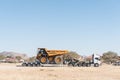 Tipper truck being transported on another truck in Namibia