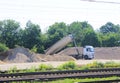 Tipper truck unload gravel Royalty Free Stock Photo