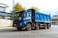 Tipper Volvo FM in motion on the street. Modern heavy duty dump truck driving on high speed