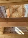 Tippy top timberframe ceiling with sunlight