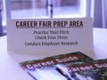 Tips and guidance for applicants on a career fair table