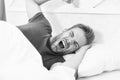 Tips sleeping better. Get enough amount of sleep every night. Bearded man sleeping face relaxing. Maintaining consistent