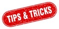 tips & tricks sign. tips & tricks grunge stamp. Royalty Free Stock Photo