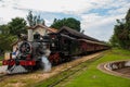 TIRADENTES ,BRAZIL: Retro train Old May Smoke in Tiradentes ,a touristic Colonial Unesco World Heritage city in Minas Gerais, Royalty Free Stock Photo