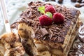 Tiramisu Cake with Grated Chocolate, Raspberry and Mint. Perfect Dessert. Royalty Free Stock Photo