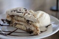 A slice of tiramisu cake with ice-cream Royalty Free Stock Photo