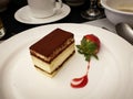 Tiramisu, a coffee-flavoured Italian dessert made of ladyfingers dipped in coffee.