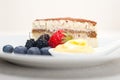 Tiramisu dessert with berries and cream