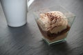 Tiramisu dessert in glass and cup of coffee on chalkb Royalty Free Stock Photo