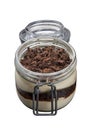 Tiramisu in glass jar on black background, traditional coffee flavored Italian dessert Royalty Free Stock Photo