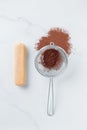Tiramisu ingredients: Italian cookie savoiardi and cocoa powder