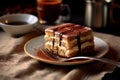 Tiramisu - Layered dessert with coffee-soaked ladyfingers, mascarpone cheese, and cocoa