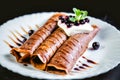 Tiramisu Pancakes with cream and berries, sweet, watering chocolate