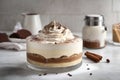 Tiramisu topped with a creamy blend of mascarpone, sugar, vanilla