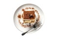 Tiramisu On White Plate , On White Background Directly Above View . On A White Plate