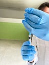 COVID-19 vaccine in the hands of medical staff. Royalty Free Stock Photo
